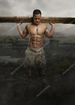 depositphotos_116412980-stock-photo-shirtless-soldier-with-wooden-timber.jpg