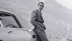 beim-dreh-zu-goldfinger-in-den-schweizer-alpen-1964-sean-connery-lehnt-am-legendaeren-aston-ma...jpg